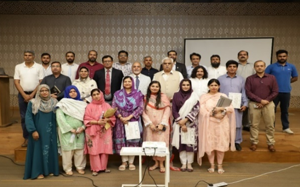 A group photo of participants/Resource person and dignitaries of a one-day seminar on Intellectual Property Rights (IPRs) at IPRs. Seminar at UOL, Lahore on June 24, 2025